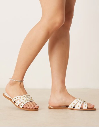 studded flat sandals in white