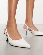 Strut slingback kitten heeled shoes in white