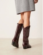 ‌Stylish studded western knee boots in burgundy