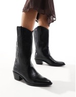 faux leather topstitched western boots in black