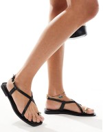 Taran hardware toe post sandals in black leather