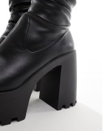 Curve Cara square toe cleated knee boots in black