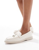 Panther tassel trim loafer in faux suede cream
