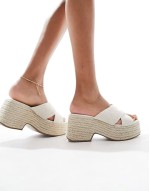 Wide Fit Toy cross strap wedges in natural fabrication