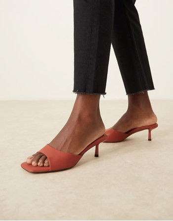 Hyped kitten heeled mules in rust