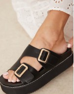 Narina asymmetric double buckle flatform sandals in black